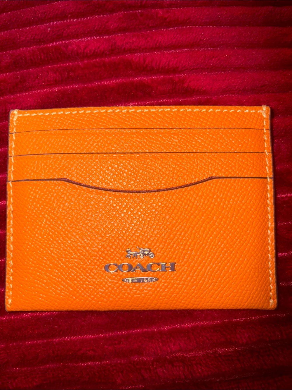 Coach Orange Pebbled Leather Card Case with Silver Logo